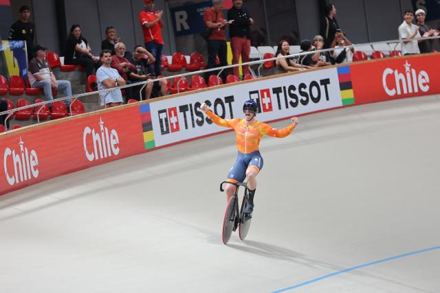 Netherlands' #168 Harrie Lavreysen celebrates after winning the men's team sprint final during the 2025 UCI Track World Championships at the Peñalolen Velodrome, in Santiago, on October 22, 2025. (Photo by Javier TORRES / AFP)
