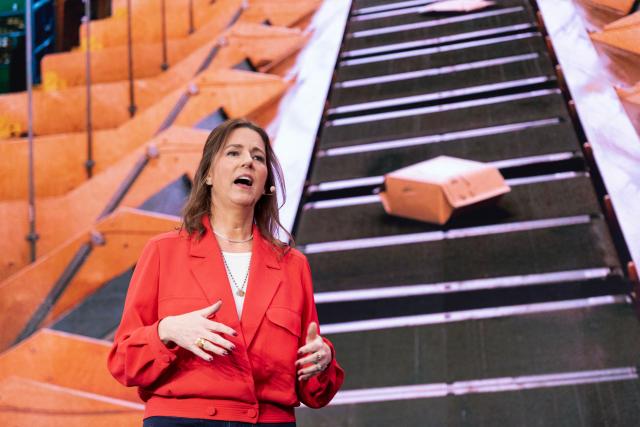 Kara Hurst, chief sustainability officer at Amazon, speaks during Amazon's "Delivering the Future" presentation at DUR3 Delivery Station in Milpitas, California on October 22, 2025. (Photo by Laure Andrillon / AFP)