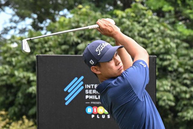 Hong Kong's Matthew Cheung plays a shot during the International Series Philippines golf tournament at Sta. Elena Golf Club in Santa Rosa, Laguna province on October 23, 2025.  (Photo by Ted ALJIBE / AFP)