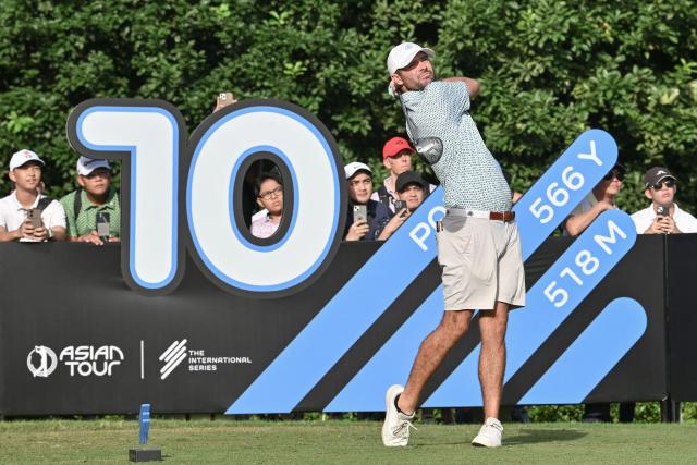 USA's Wesley Bryan tees off at the 10th hole during the International Series Philippines golf tournament at Sta. Elena Golf Club in Santa Rosa, Laguna province on October 23, 2025.  (Photo by Ted ALJIBE / AFP)