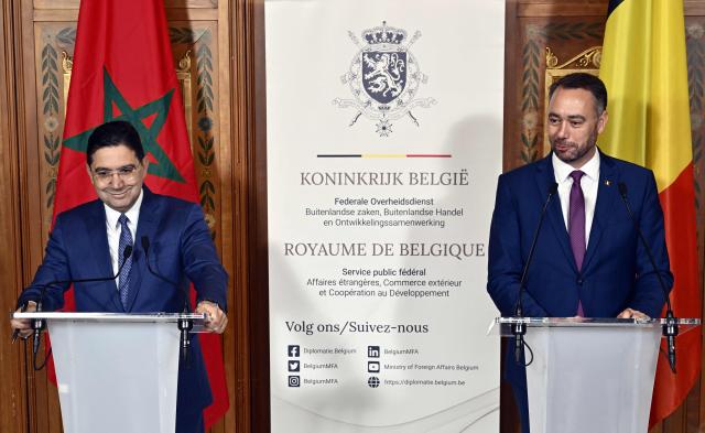 Morocco's Foreign Minister Nasser Bourita (L) and Belgium's Vice-Prime Minister and Foreign Minister, Maxime Prevot, attend the signing of an agreement between Belgium and Morocco on security, justice and migration, at the Egmont Palace in Brussels, on October 23, 2025. (Photo by ERIC LALMAND / Belga / AFP) / Belgium OUT