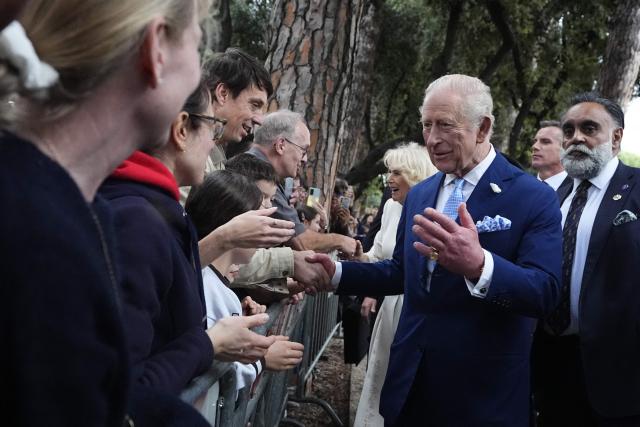 King Charles III and Queen Camilla meet members of the public outside the Papal Basilica and Abbey of St Paul's Outside the Wall after a service in Rome on October 23, 2025. (Photo by Aaron Chown / POOL / AFP)