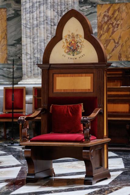 The specially designed chair, bearing King Charles's coat of arms and the Latin inscription Ut unum sint ("That they may be one" - John 17:21), used during the ceremony appointing King Charles as Royal Confrater of Saint Paul, at the Basilica of Saint Paul Outside the Walls, Italy, 23 October 2025. (Photo by GIUSEPPE LAMI / POOL / AFP)