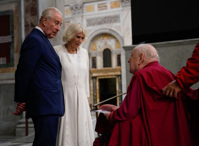 King Charles, with Queen Camilla, attend the ceremony of his appointment as Royal Confrater of St. Paul at the Basilica of Saint Paul Outside the Walls, in Rome, Italy, 23 October 2025. (Photo by GIUSEPPE LAMI / POOL / AFP)