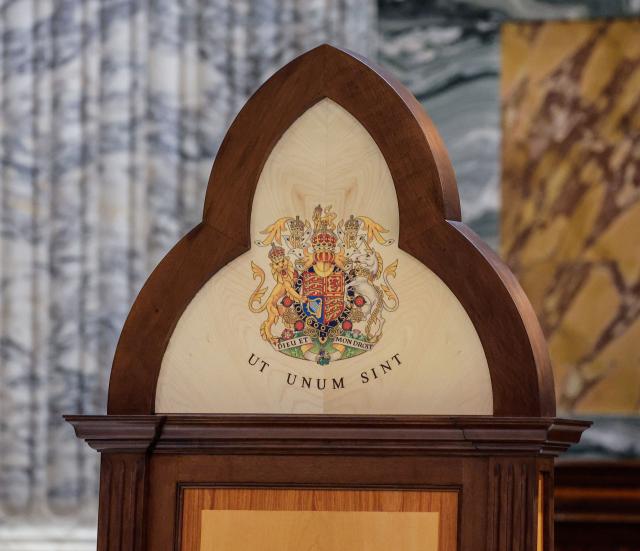 The specially designed chair, bearing King Charles's coat of arms and the Latin inscription Ut unum sint ("That they may be one" - John 17:21), used during the ceremony appointing King Charles as Royal Confrater of Saint Paul, at the Basilica of Saint Paul Outside the Walls, Italy, 23 October 2025. (Photo by GIUSEPPE LAMI / POOL / AFP)