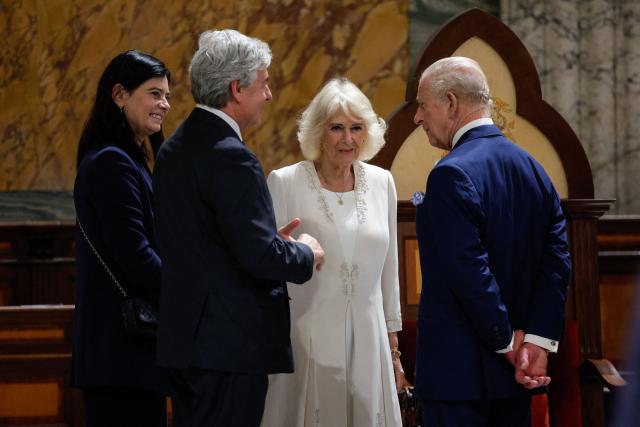 King Charles, with Queen Camilla, attend the ceremony of his appointment as Royal Confrater of St. Paul at the Basilica of Saint Paul Outside the Walls, in Rome, Italy, 23 October 2025. (Photo by GIUSEPPE LAMI / POOL / AFP)