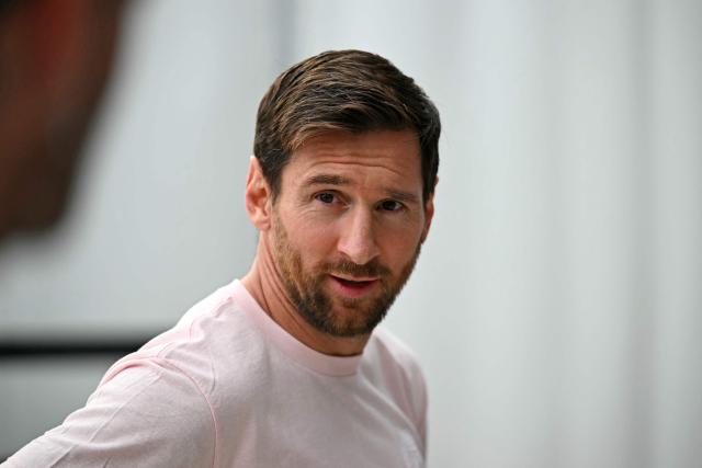 (FILES) Inter Miami's Argentine forward Lionel Messi arrives for the Major League Soccer (MLS) regular season football match between Inter Miami CF and New England Revolution at Chase Stadium in Fort Lauderdale, Florida, on October 4, 2025. The North American football league (MLS) announced on October 23, 2025  that Lionel Messi has renewed his contract with Inter Miami, ensuring that the Argentine star will be active during next year's World Cup. (Photo by CHANDAN KHANNA / AFP)