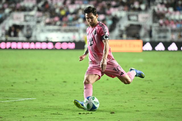(FILES) Inter Miami's Argentine forward #10 Lionel Messi kicks the ball during the Major League Soccer (MLS) regular season football match between Inter Miami CF and Chicago Fire FC at Chase Stadium in Fort Lauderdale, Florida, on September 30, 2025. The North American football league (MLS) announced on October 23, 2025  that Lionel Messi has renewed his contract with Inter Miami, ensuring that the Argentine star will be active during next year's World Cup. (Photo by CHANDAN KHANNA / AFP)