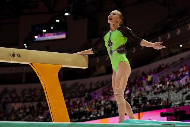 Individual Neutral Athlete (AIN) Angelina Melnikova reacts as she falls from the balance beam during the women's all-around final at the 53rd FIG Artistic Gymnastics World Championships in Jakarta on October 23, 2025. (Photo by Yasuyoshi CHIBA / AFP)