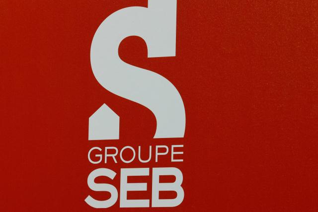 (FILES) This photograph shows the logo of the SEB group displayed during the annual general meeting in Paris on May 23, 2024. In difficulty, the SEB household appliance group announces a "cost-cutting plan" of Ђ200 million per year starting in 2027. (Photo by GEOFFROY VAN DER HASSELT / AFP)