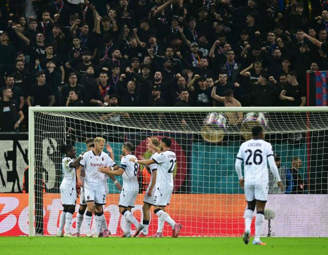 Bologna's Danish forward #21 Jens Odgaard (3rd L) celebrates after scoring the 0-1 during the UEFA Europa League first round - day 3 football match between FCSB and Bologna FC 1909 in Bucharest, southern Romania on October 23, 2025. (Photo by Daniel MIHAILESCU / AFP)