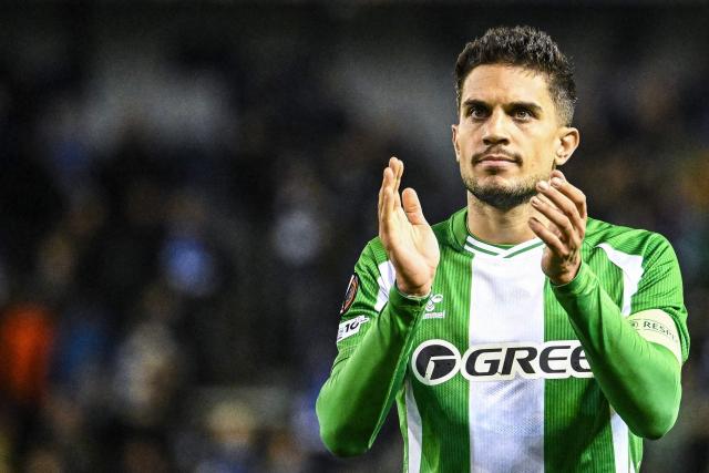 Real Betis' Spanish defender #05 Marc Bartra reacts at the end of the UEFA Europa League first round day 3 football match between KRC Genk and Real Betis Balompie, in Genk on October 23, 2025. (Photo by Tom Goyvaerts / Belga / AFP) / Belgium OUT