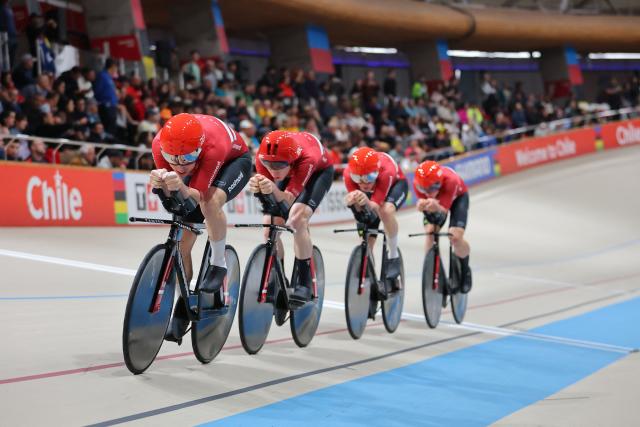 Denmark's #13 Tobias Hansen, #14 Niklas Larsen, Frederik Madsen and Rasmus Perdersen  competes in the men's team pursuit final event of the 2025 UCI Track World Championships at the Penalolen Velodrome, in Santiago, on October 23, 2025. (Photo by Javier TORRES / AFP)