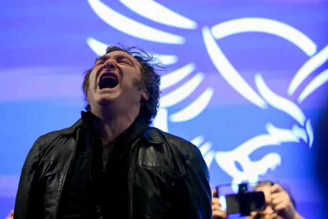 Argentina's President Javier Milei shouts during the closing campaign rally of Libertad Avanza party ahead of the upcoming legislative elections in Rosario, Santa Fe province, Argentina on October 23, 2025. Milei, once a global poster boy for budget-slashing libertarian politics, is heading into the polls diminished by his failure to stabilize Argentina's ailing peso despite spending nearly all the Central Bank's dollar reserves to prop it up. (Photo by Luis ROBAYO / AFP)
