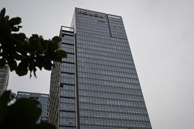 This photo taken on October 21, 2025 shows the logo of Chinese smartphone company Honor at its headquarter in Shenzhen, in southern China's Guangdong province. (Photo by Jade GAO / AFP)