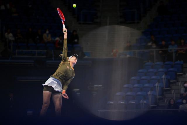 Kazakhstan's Elena Rybakina serves against Canada's Victoria Mboko during their women's singles match at the Pan Pacific Open tennis tournament in Tokyo on October 24, 2025. (Photo by Philip FONG / AFP)