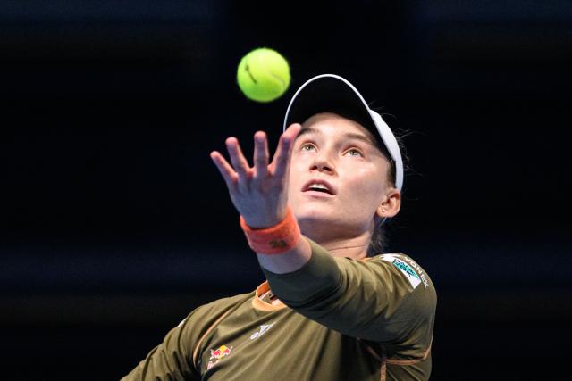 Kazakhstan's Elena Rybakina serves against Canada's Victoria Mboko during their women's singles match at the Pan Pacific Open tennis tournament in Tokyo on October 24, 2025. (Photo by Philip FONG / AFP)