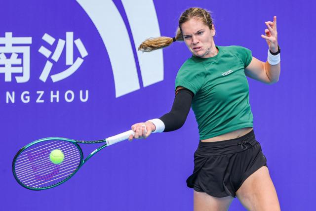 USA´s Caty McNally hits a return to New Zealand´s Lulu Sun during their women's singles quarterfinal match at the Guangzhou Open tennis tournament in Guangzhou? China's southern Guangdong province on October 24, 2025. (Photo by AFP)