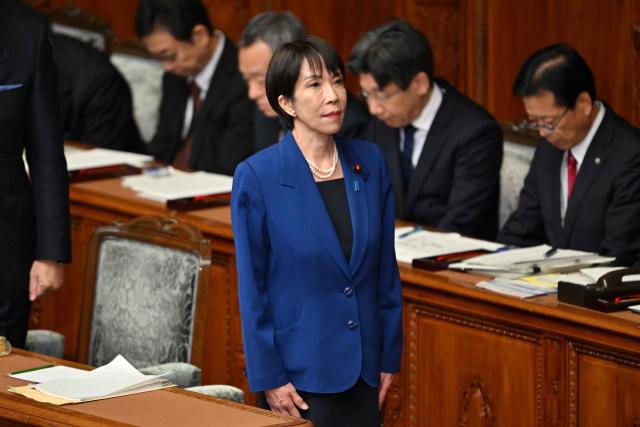 Japan's Prime Minister Sanae Takaichi attends the House of Representatives plenary session to deliver her policy speech in Tokyo on October 24, 2025. Japan's new prime minister Sanae Takaichi said on October 24 she would try to achieve the country's target of spending two percent of GDP on defence two years early. (Photo by Kazuhiro NOGI / AFP)