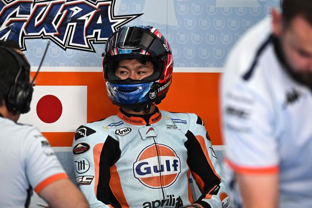 Trackhouse MotoGP's Japanese rider Ai Ogura rests during the first practice of the MotoGP Malaysian Grand Prix at the Sepang International Circuit in Sepang on October 24, 2025. (Photo by Lillian SUWANRUMPHA / AFP)