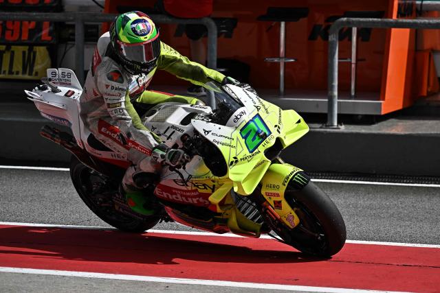 Pertamina Enduro VR64 Racing's Italian rider Franco Morbidelli drives through the pit lane during the first practice of the MotoGP Malaysian Grand Prix at the Sepang International Circuit in Sepang on October 24, 2025. (Photo by Lillian SUWANRUMPHA / AFP)