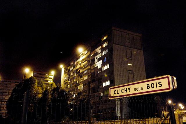 (FILES) View taken 31 October 2005 of the northern Paris suburb of Clichy-sous-Bois where police clashed with angry youths for the fifth straight night following the death by electrocution, 27 October, of two boys trying to escape from police. On October 27, 2005, Zyed Benna and Bouna Traore, aged 17 and 15, died from electrocution in an EDF power substation where they had taken refuge after being chased by the police. This tragedy sparked a series of riots that spread from Clichy-sous-Bois to the rest of the country for three weeks, leading to the declaration of a state of emergency. (Photo by STEPHANE DE SAKUTIN / AFP)