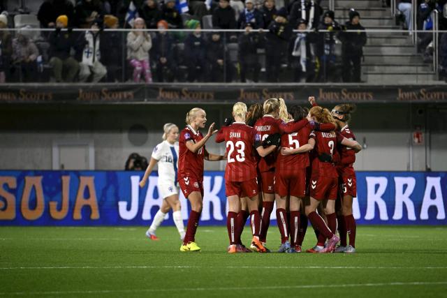 Denmark's team celebrates the 0-1 goal by Emma Snerle during the UEFA Women's Nations League semi-final football match between Finland and Denmark in Tampere, Finland on October 24, 2025. (Photo by Antti Aimo-Koivisto / Lehtikuva / AFP) / Finland OUT