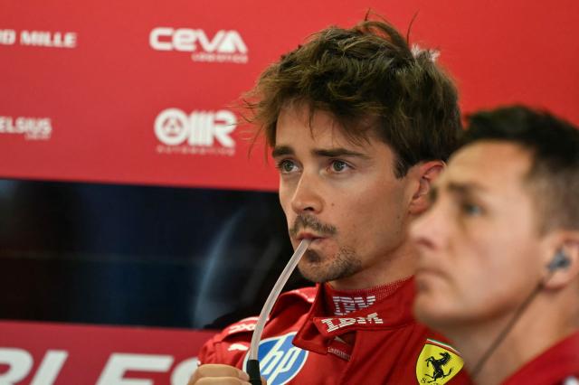 Ferrari's Monegasque driver Charles Leclerc watches the first practice session of the Mexico City Formula One Grand Prix from the garage at the Hermanos Rodriguez racetrack in Mexico City on October 24, 2025. (Photo by Carl DE SOUZA / AFP)