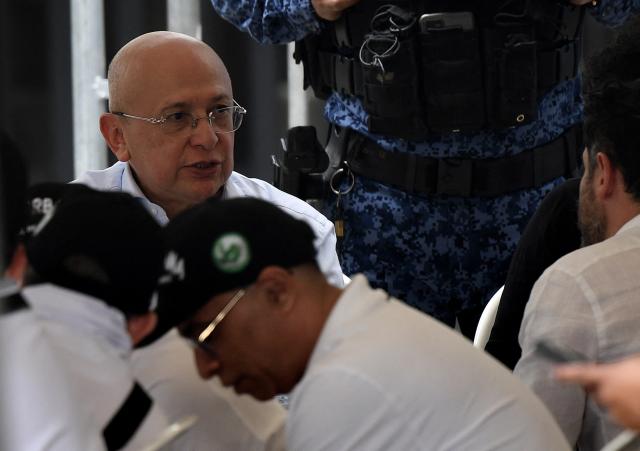 (FILES) Colombia's Minister of Justice and Law Luis Eduardo Montealegre speaks with members of the urban peace process during the "Pact for Urban Peace" rally at the administrative center of La Alpujarra in Medellin, Colombia, June 21, 2025. Montealegre submitted his “irrevocable” resignation to Gustavo Petro's government on October 24, 2025 to focus on challenging the recent acquittal of former President Alvaro Uribe in a case involving bribery and procedural fraud. (Photo by JAIME SALDARRIAGA / AFP)