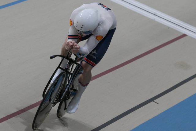 Great Britain's  #124 Joseph Truman competes in the men's 1km time trial race final at the 2025 UCI Track World Championships, in the Penalolen Velodrome in Santiago, on October 24, 2025. (Photo by Rodrigo ARANGUA / AFP)