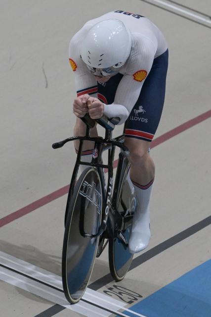 Great Britain's  #124 Joseph Truman competes in the men's 1km time trial race final at the 2025 UCI Track World Championships, in the Penalolen Velodrome in Santiago, on October 24, 2025. (Photo by Rodrigo ARANGUA / AFP)