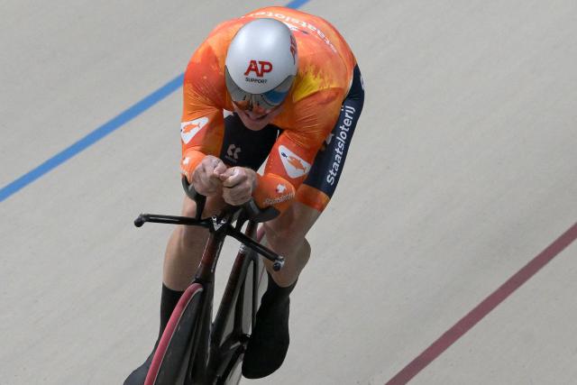Netherlands' #166 Jeffrey Hoogland competes in the men's 1km time trial race final at the 2025 UCI Track World Championships, in the Penalolen Velodrome in Santiago, on October 24, 2025. (Photo by Rodrigo ARANGUA / AFP)
