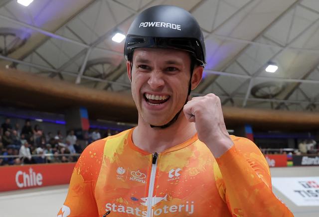 Netherlands' #168 Harrie Lavreysen reacts after winning the men's 1km time trial race final at the 2025 UCI Track World Championships, in the Penalolen Velodrome in Santiago, on October 24, 2025. (Photo by Javier TORRES / AFP)