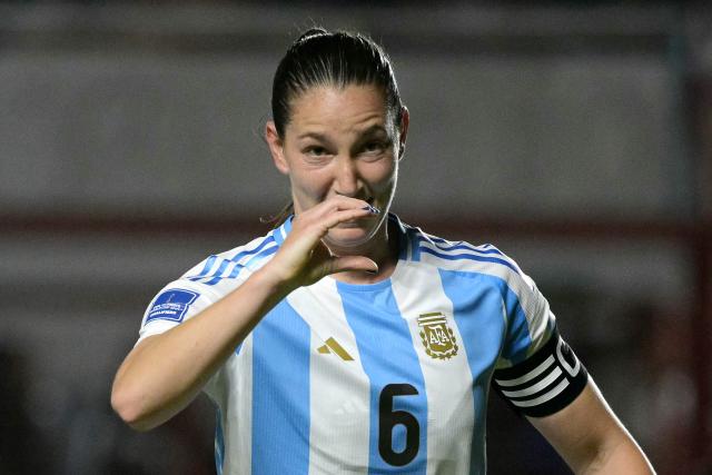Argentina's defender #06 Aldana Cometti celebrates scoring her team's first goal during the Conmebol Women's Nations League 2025-26 football match between Argentina and Paraguay at the Diego Armando Maradona Stadium in Buenos Aires on October 24, 2025. (Photo by JUAN MABROMATA / AFP)