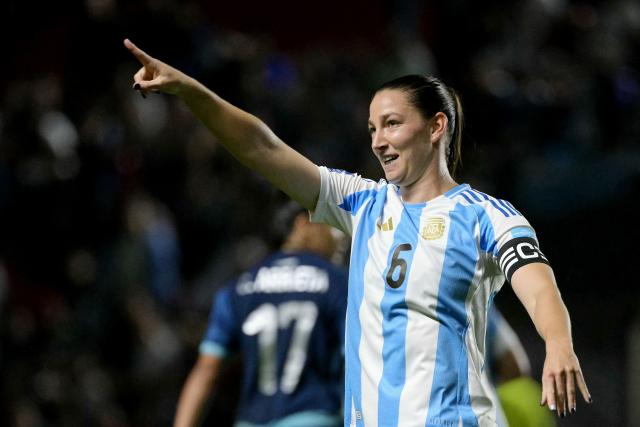 Argentina's defender #06 Aldana Cometti celebrates scoring her team's first goal during the Conmebol Women's Nations League 2025-26 football match between Argentina and Paraguay at the Diego Armando Maradona Stadium in Buenos Aires on October 24, 2025. (Photo by JUAN MABROMATA / AFP)