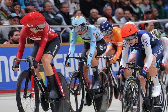 Denmark's #13 Amalie Dideriksen (L), Belgium's #04 Shari Bossuyt (C) and France's #18 Marion Borras compete in the women's omnium IV event final at the 2025 UCI Track World Championships, in the Penalolen Velodrome in Santiago, on October 24, 2025. (Photo by Javier TORRES / AFP)