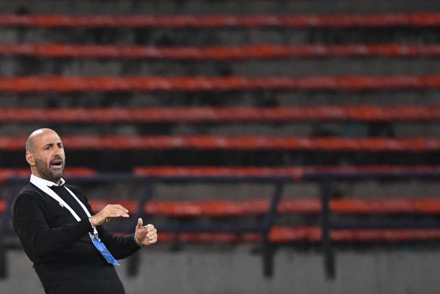 Peru's Argentine head coach Antonio Spinelli gestures during the Conmebol Women's Nations League 2025-26 football match between Colombia and Peru at the Atanasio Girardot Stadium in Medellin, Colombia on October 24, 2025. (Photo by Jaime SALDARRIAGA / AFP)