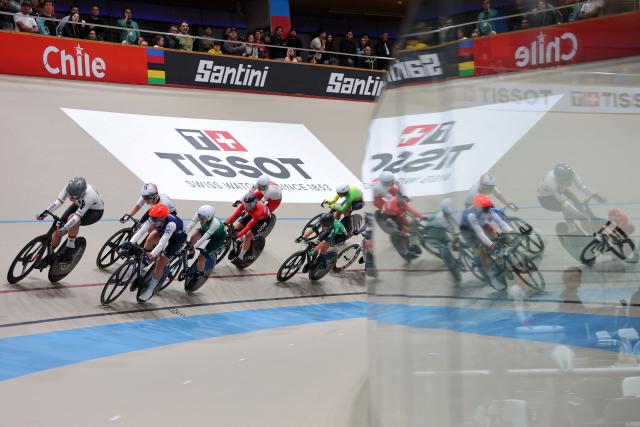 Cyclists compete in the women's omnium IV event final at the 2025 UCI Track World Championships, in the Penalolen Velodrome in Santiago, on October 24, 2025. (Photo by Javier TORRES / AFP)