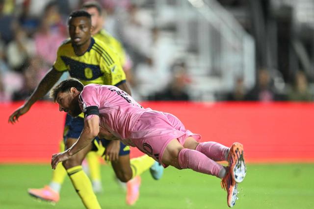 Inter Miami's Argentine forward Lionel Messi watches the ball as he scores with a header during the Major League Soccer (MLS) playoff football match between Inter Miami and Nashville SC at Chase Stadium in Fort Lauderdale, Florida on October 24, 2025. (Photo by Chandan Khanna / AFP)