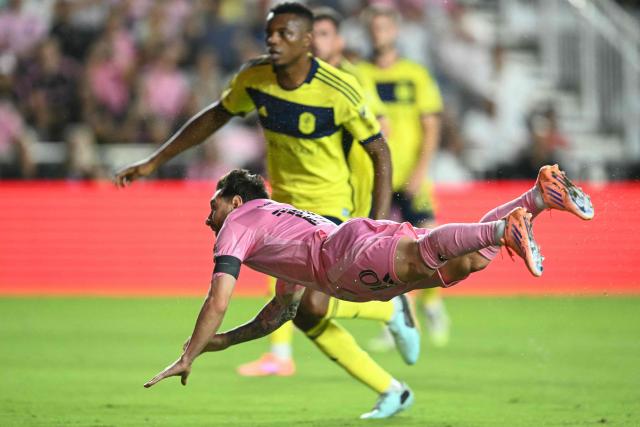 Inter Miami's Argentine forward Lionel Messi watches the ball as he scores with a header during the Major League Soccer (MLS) playoff football match between Inter Miami and Nashville SC at Chase Stadium in Fort Lauderdale, Florida on October 24, 2025. (Photo by Chandan Khanna / AFP)