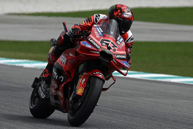 Ducati Lenovo Team's Italian MotoGP rider Francesco Bagnaia rides during the qualifying session of the MotoGP Malaysian Grand Prix at the Sepang International Circuit in Sepang on October 25, 2025. (Photo by Lillian SUWANRUMPHA / AFP)