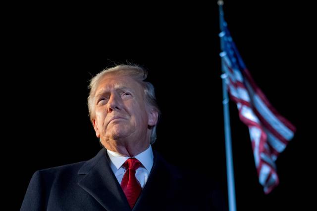 US President Donald Trump speaks to the media as he walks to Marine One prior to departure from the South Lawn of the White House in Washington, DC, October 24, 2025, as he travels on a week-long trip to Asia. (Photo by SAUL LOEB / AFP)