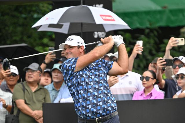 USA's Patrick Reed tees off on hole 1 during round 3 of the International Series Philippines golf tournament at Sta. Elena Golf Club in Santa Rosa, Laguna province on October 25, 2025.  (Photo by Ted ALJIBE / AFP)