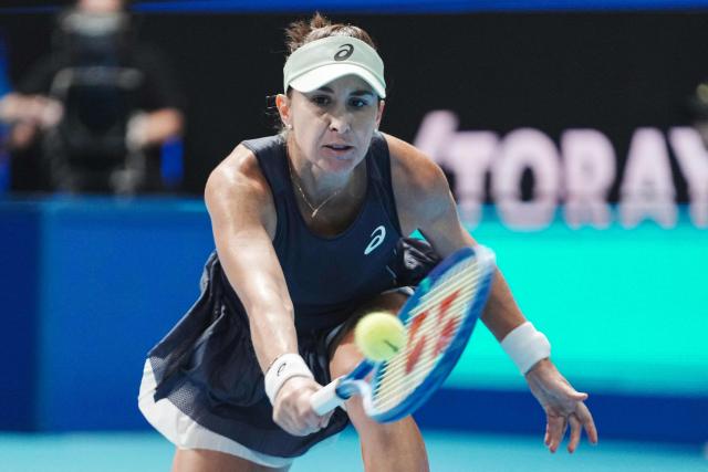 Switzerland's Belinda Bencic hits a return against USA's Sofia Kenin during their women's singles semi-finals at the Pan Pacific Open tennis tournament in Tokyo on October 25, 2025. (Photo by Kazuhiro NOGI / AFP)