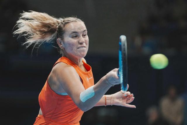 USA's Sofia Kenin hits a return against Switzerland's Belinda Bencic during their women's singles semi-finals at the Pan Pacific Open tennis tournament in Tokyo on October 25, 2025. (Photo by Kazuhiro NOGI / AFP)