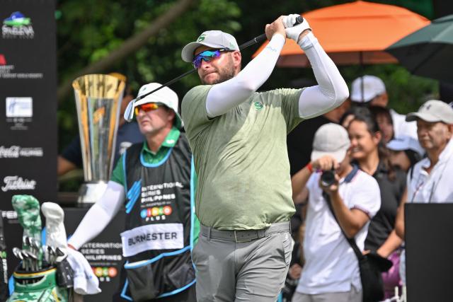 South Africa's Dean Burmester tees off on the first hole during round 3 of the International Series Philippines golf tournament at Sta. Elena Golf Club in Santa Rosa, Laguna province on October 25, 2025.  (Photo by Ted ALJIBE / AFP)