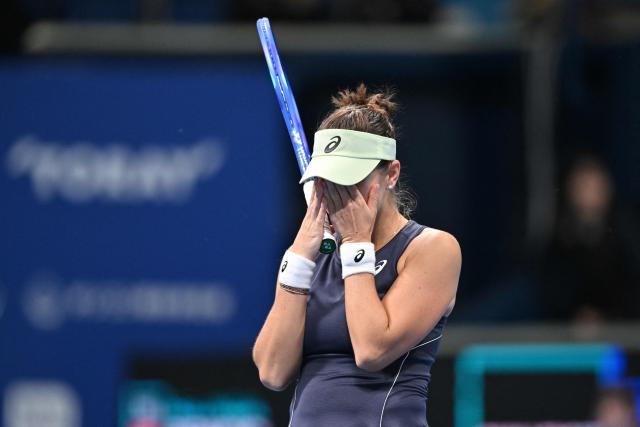 Switzerland's Belinda Bencic reacts as she celebrates her win over USA's Sofia Kenin after their women's singles semi-finals at the Pan Pacific Open tennis tournament in Tokyo on October 25, 2025. (Photo by Kazuhiro NOGI / AFP)