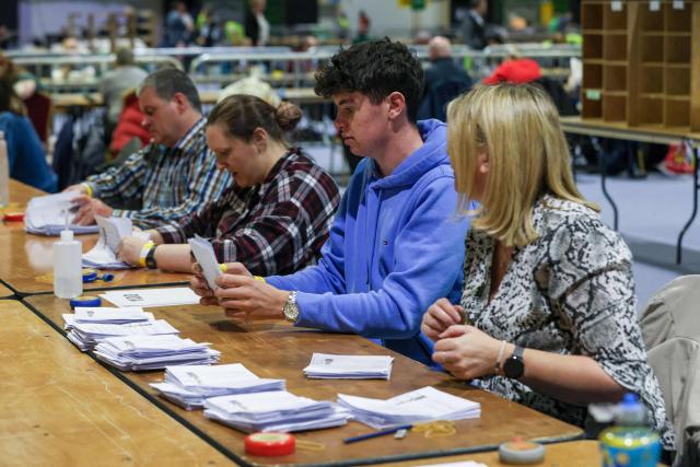 Counting of ballots takes place in the Irish Presidential election at the RDS count centre in Dublin City centre in Ireland on October 25, 2025. The Irish are expected to know their new president by the end of Saturday, who will succeed Michael Higgins, 84, for seven years, after two terms since 2011 in this essentially ceremonial position. (Photo by Paul Faith / AFP)