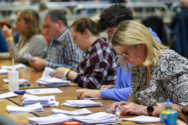 Counting of ballots takes place in the Irish Presidential election at the RDS count centre in Dublin City centre in Ireland on October 25, 2025. The Irish are expected to know their new president by the end of Saturday, who will succeed Michael Higgins, 84, for seven years, after two terms since 2011 in this essentially ceremonial position. (Photo by Paul Faith / AFP)