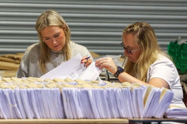 Counting of ballots takes place in the Irish Presidential election at the RDS count centre in Dublin City centre in Ireland on October 25, 2025. The Irish are expected to know their new president by the end of Saturday, who will succeed Michael Higgins, 84, for seven years, after two terms since 2011 in this essentially ceremonial position. (Photo by Paul Faith / AFP)